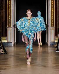 Indian fashion designers showcasing contemporary and traditional outfits at London Fashion Week 2025, highlighting India’s global influence in fashion and design.